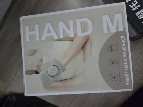 Customer review photo hand massager packaging