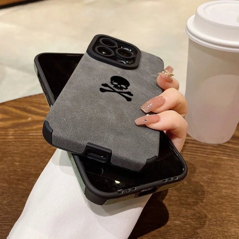 รูปสินค้า เคสโทรศัพท์ลายกะโหลก หนังเทียมดำด้าน