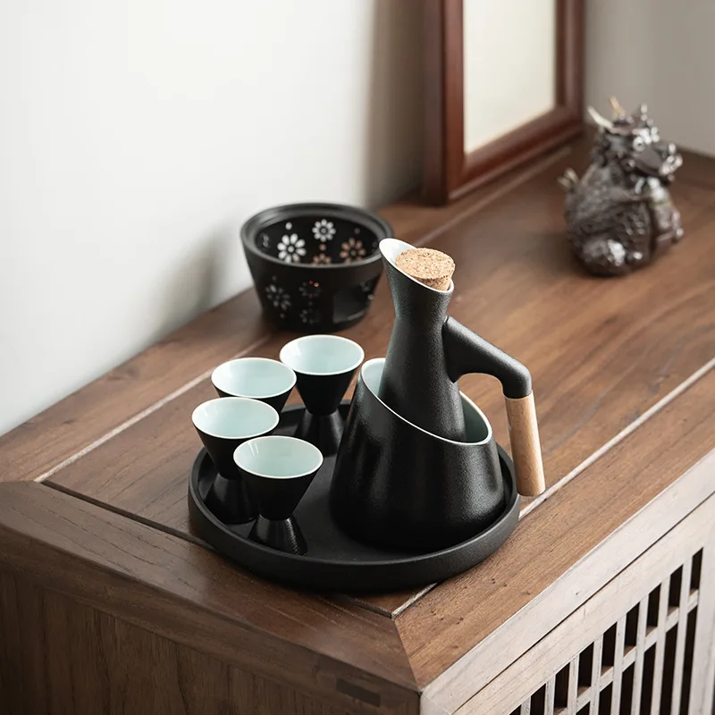 Japanese-style ceramic wine cabinet set includes 1 wine jug, 1 cabinet, 4 sake glasses, tray and candle heater
