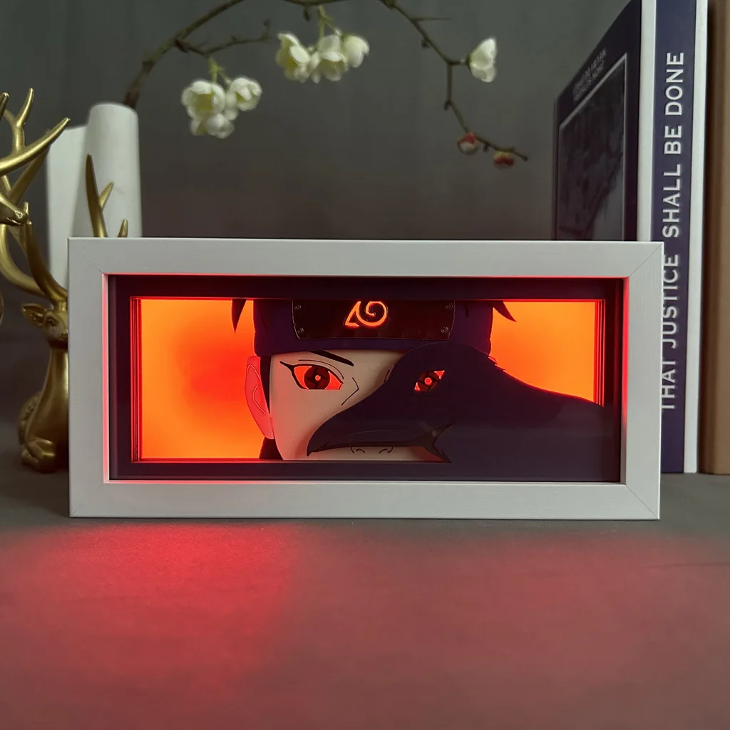 thumbnail image 1 of Periféricos de anime de NARUTO, figura de Itachi con luz LED, caja de sombras cortada con papel, figuras de Sasuke, caja de luz, estatua de Obito, adornos de escritorio, juguetes, 1 of 5