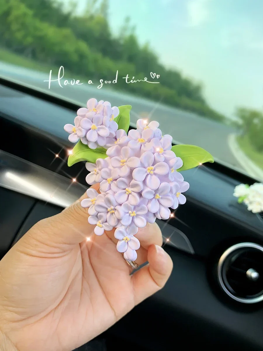 

Car interior aromatherapy lilac floral ornaments decorated ladies flower diffusion stone advanced car air conditioning outlet.