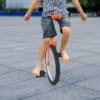 22241-9a1b8f.jpg Orange Outdoor Exercise Unicycle Single Wheel Bike with Adjustable Height Comfortable Seat And Knurled Seatpost for Fitness Riding