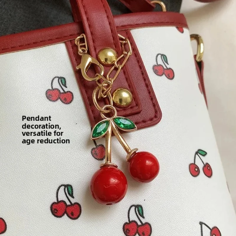 Women PU Cherry Shoulder Bag Large Capacity Trendy Commuting Bag with Cherry Pendant Stylish Crossbody Bag Aesthetic Handbag