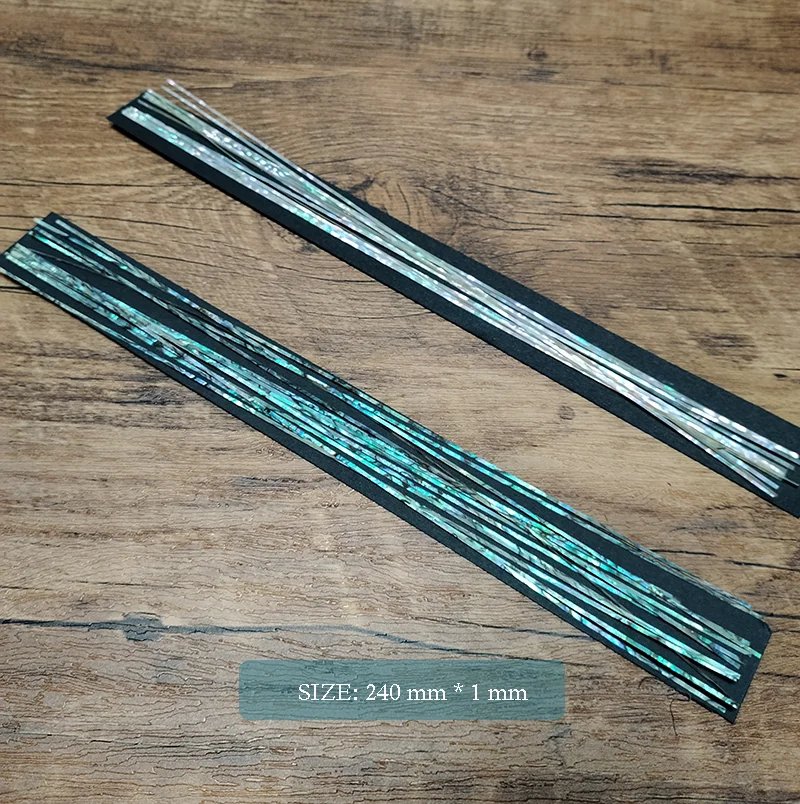 Tasselli Abalone Paua 105 Punti (100 5 Gratis) In Abalone/Paua Per Chitarra - Diametro 2.38 Mm (3/32), Fronte Colorato, Grado A Tasti In Madreperla Grado A