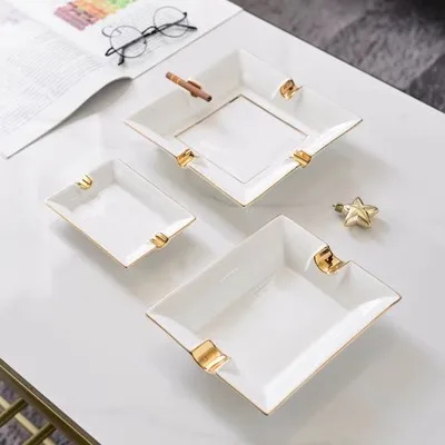 

Support the customization of American style authentic bone porcelain ceramic gold-painted ashtrays with logos