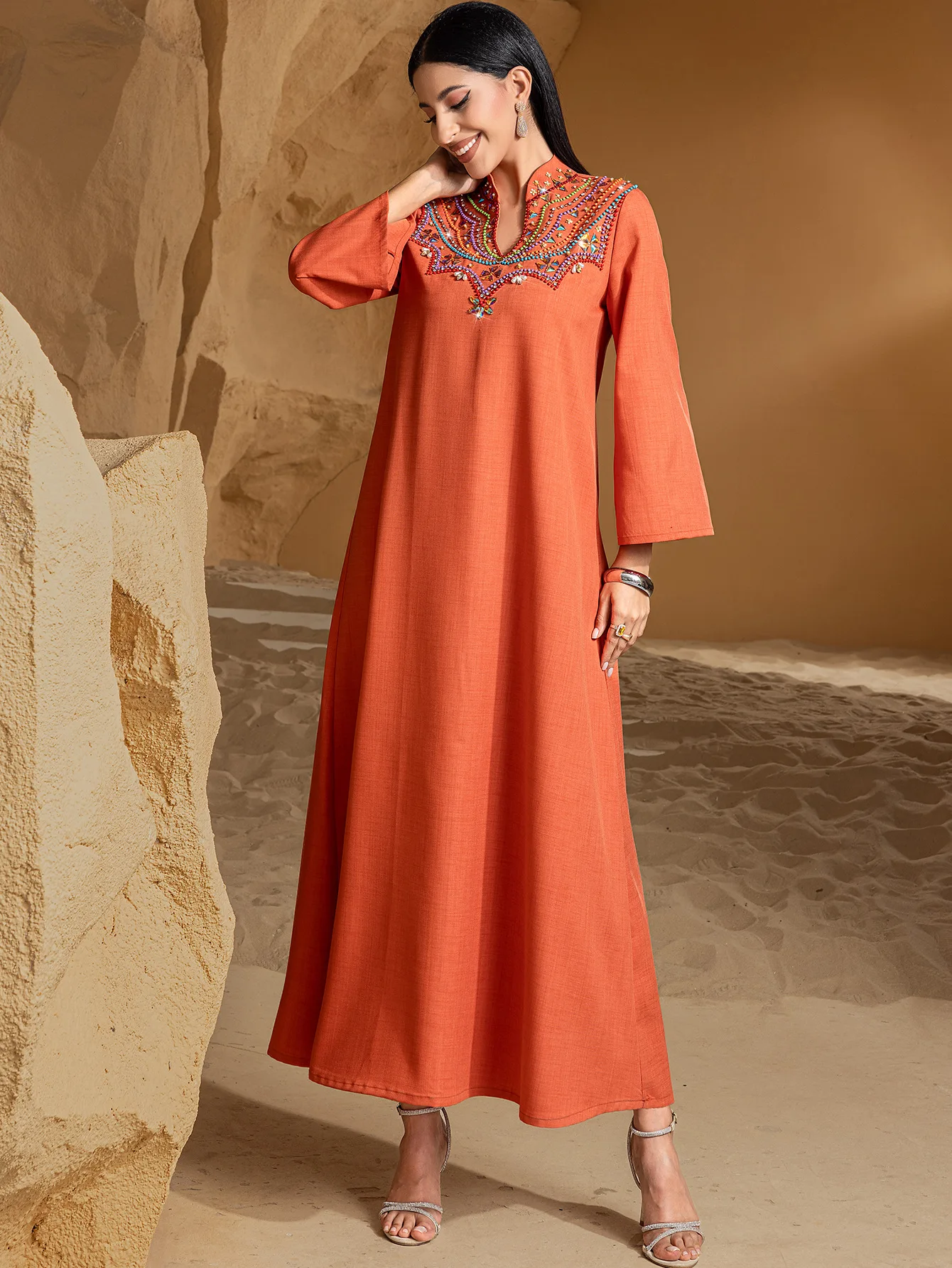 جلابية برتقالي محروق بتطريز ملون فاخر