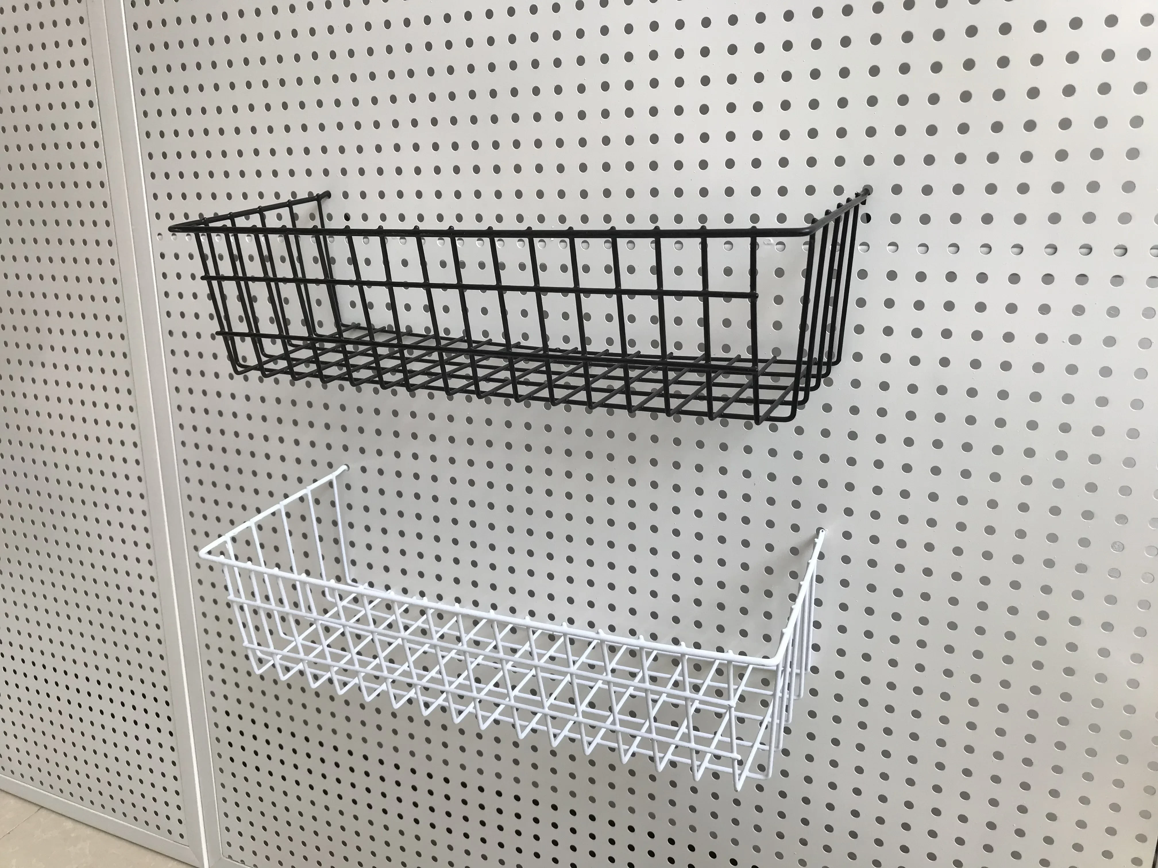 

Universal hanging basket for circular hole hole hole board storage basket