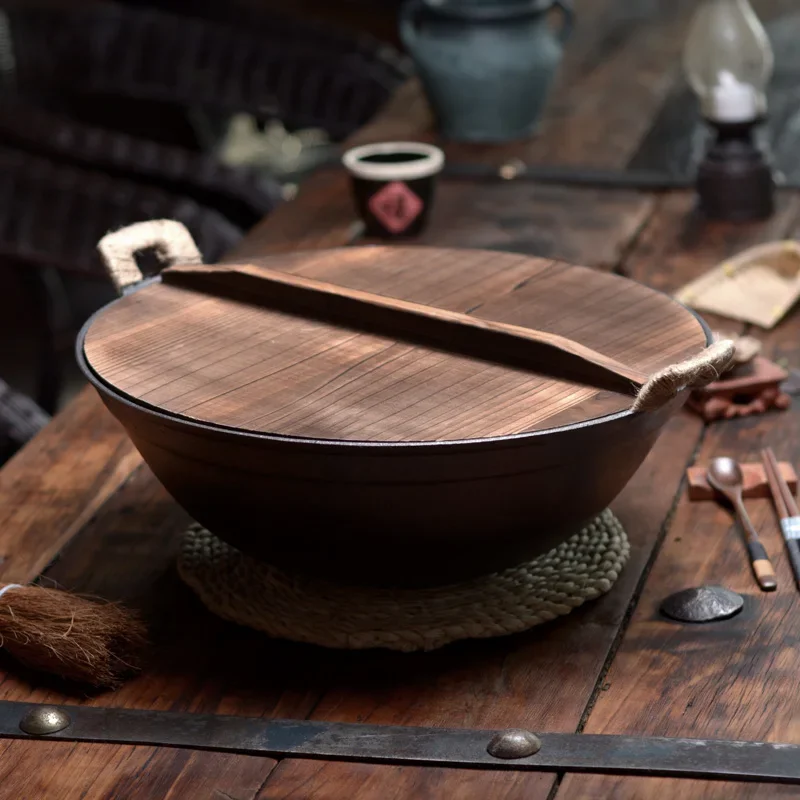 

Старое круглое дно большой железный горшок Deepened бытовой утолщенный непокрытый литой ВОК