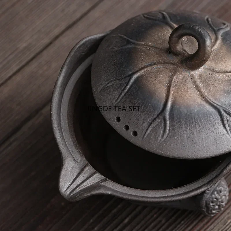 Rough pottery lotus leaf hand-held pot Chinese retro old rock mud gold-plated iron glaze Kung Fu tea set lid bowl