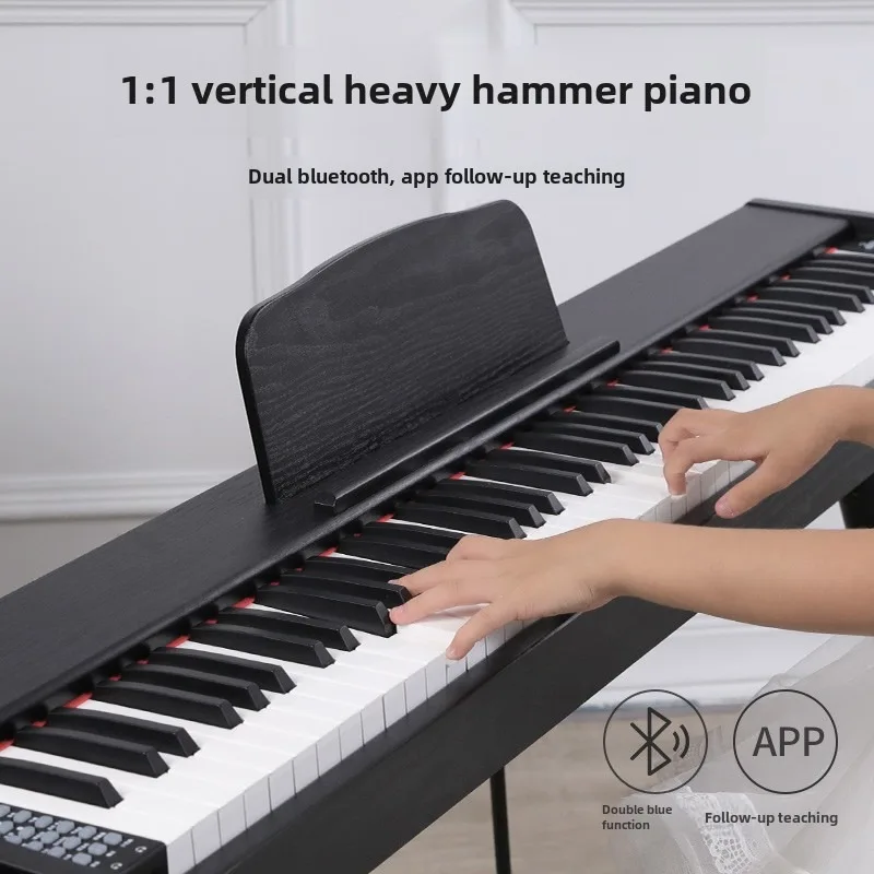 The 88-key portable teaching electric piano is generally used for professional grading 88001