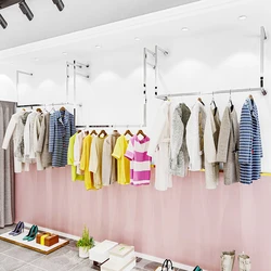 Custom, Hot Selling Brass Gold Floor Clothing Display Racks Steel Apparel Display Wall Clothing Rack