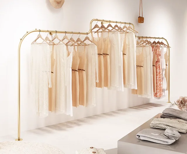 Wall mounted hanging clothes pole on the display rack Wall mounted hanging clothes pole on the display rack