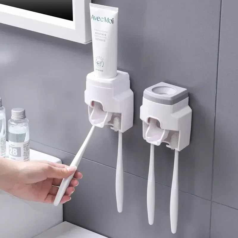 

Creative wall mounted and small toothbrush holder for automatic toothpaste dispenser, home shower and bathroom squeezer