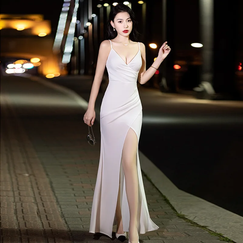 

Sexy low cut sleeveless suspender, elegant and slim fitting long slit evening dress, banquet dress