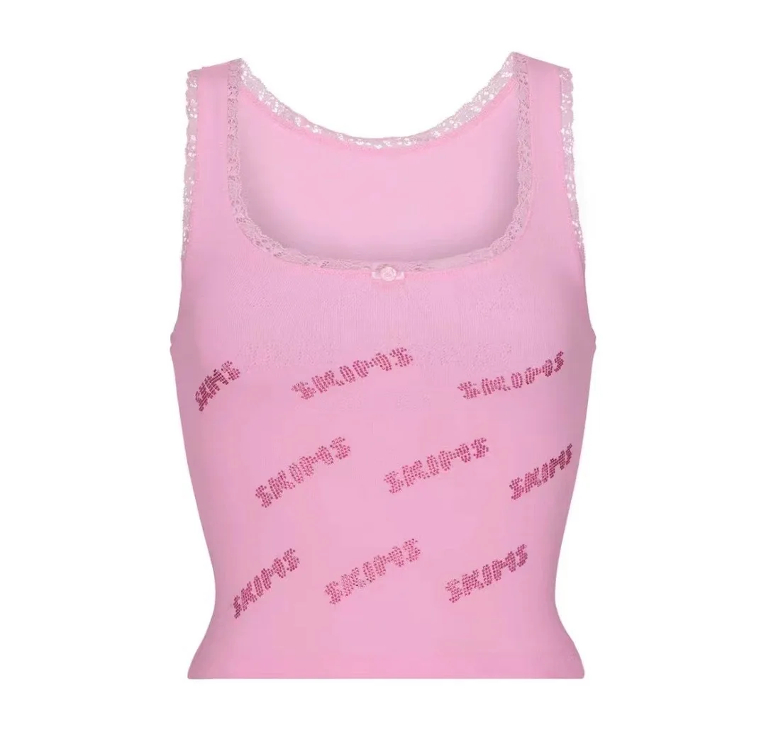 

kim karadashian pink pressed diamond letter logo lace stretch bodice vest slimming top