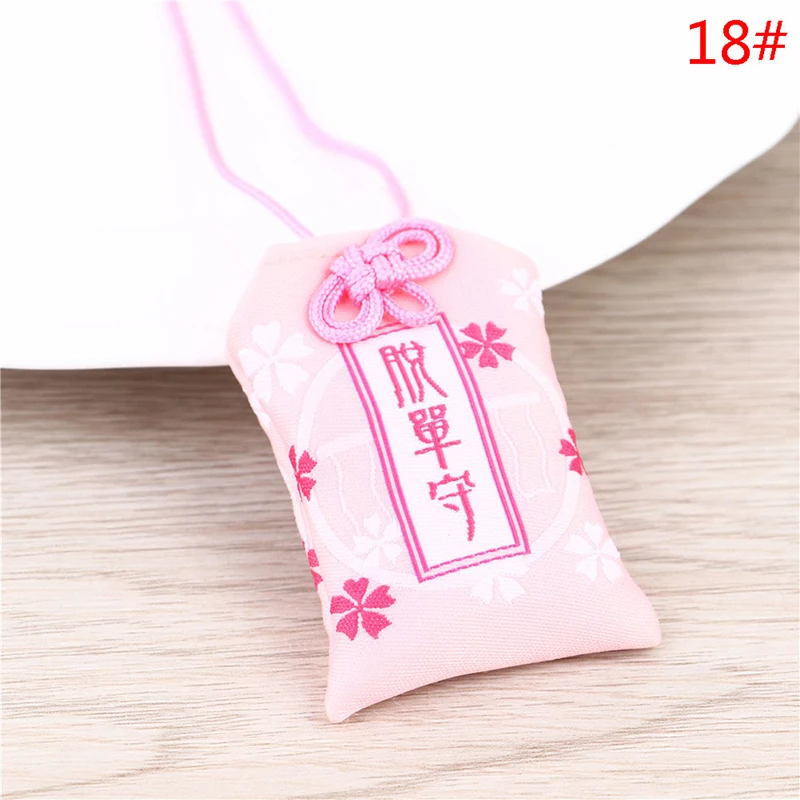 10 Amuleti Omamori Giapponesi - Portafortuna Tradizionali Per Salute E Ricchezza - Foto 1