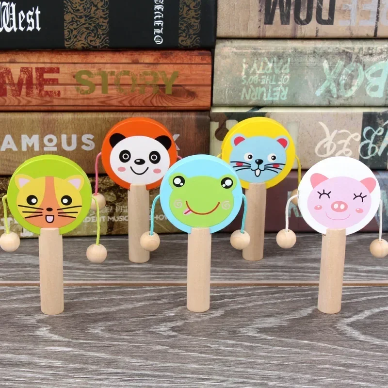 

Baby Cartoon Wooden Rattle Music Toys Kid Wooden Rattle Drum Musical Instrument Percussion Toys Child Education Tool Gifts