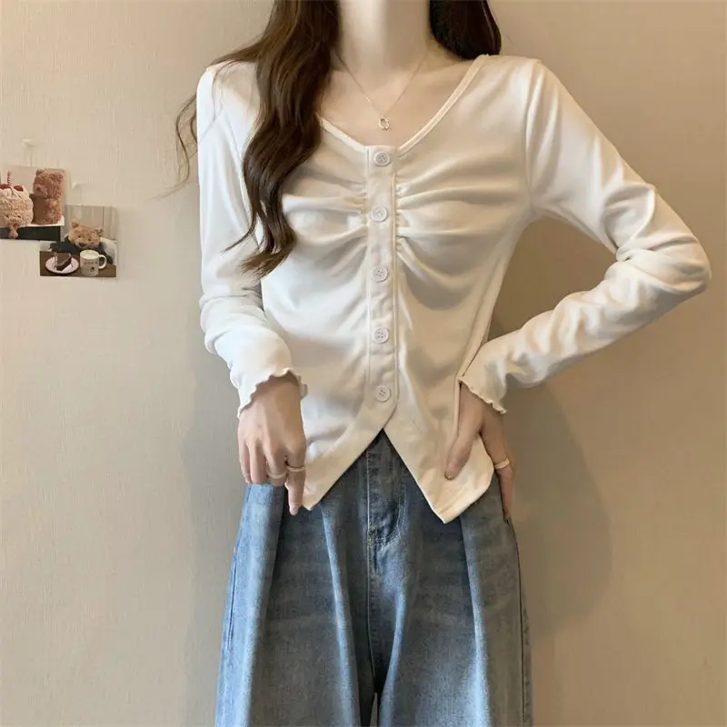 T-shirt nuovo stile Top irregolare a maniche lunghe per l'autunno 2