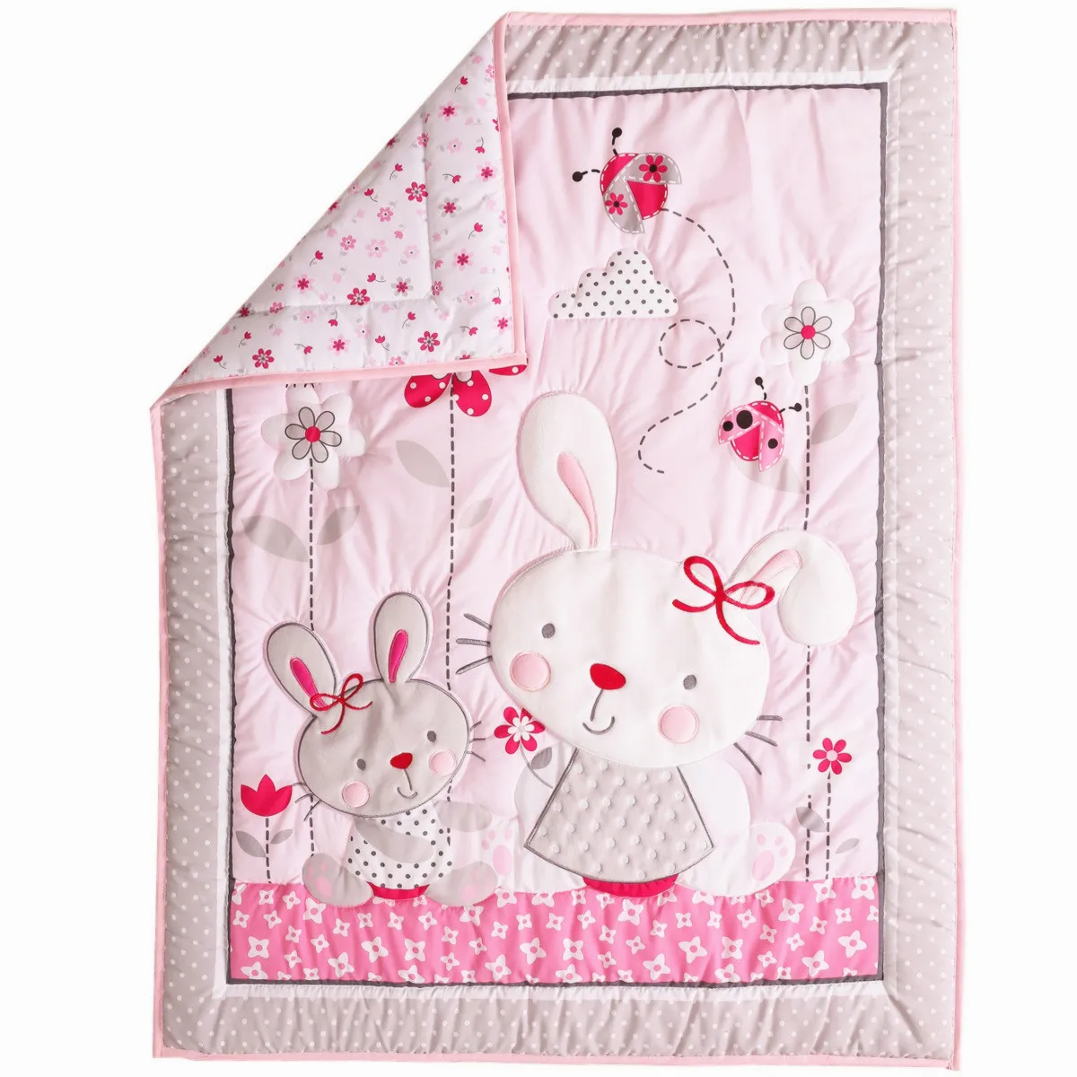 Couette d'un tour de lit bébé fille rose motif dessins animés