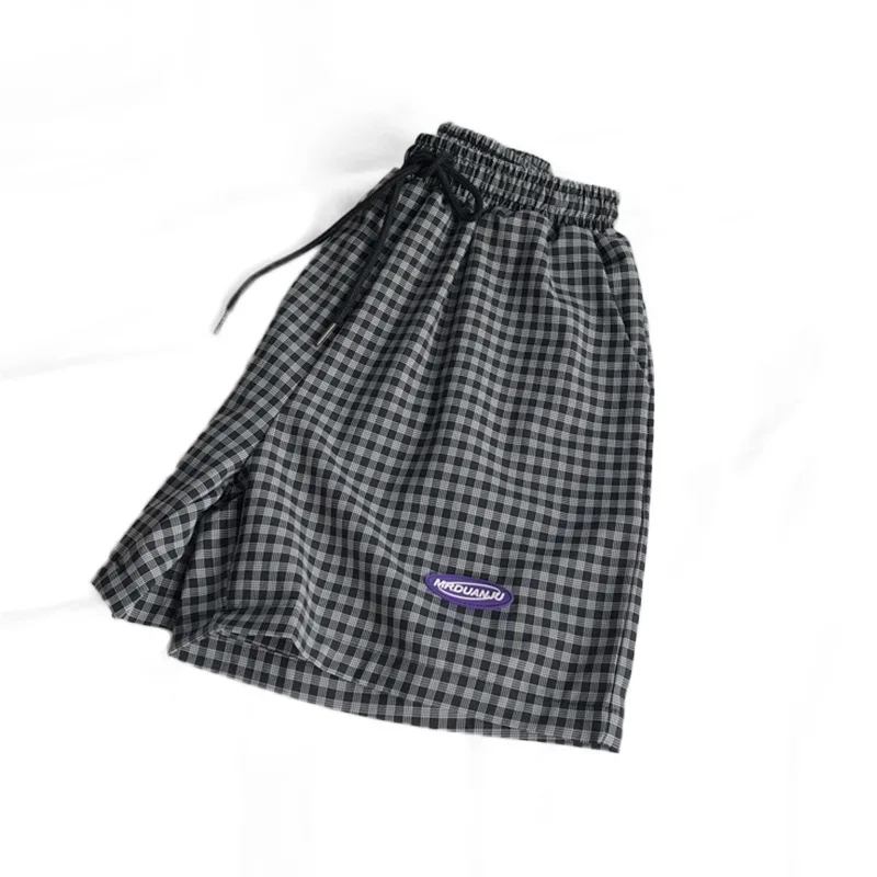 Рисунок 5 - Черные клетчатые шорты для женщин