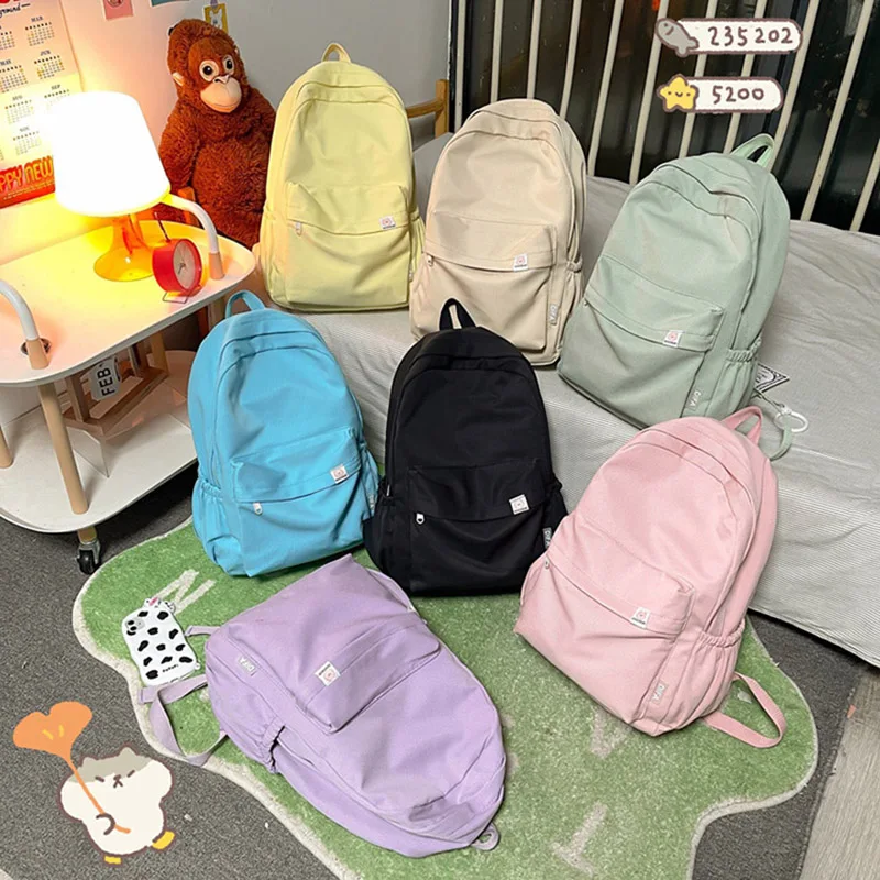 

2023 New Nylon Waterproof Girls Backpack Class Travel Solid ColorLarge capity Sweet Soft College Student High quality School Bag