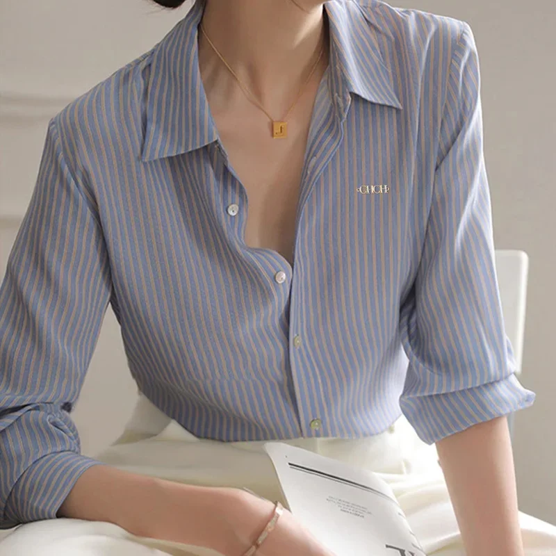 รูปสินค้า เสื้อคลาสสิกวินเทจ แขนยาว ลายทาง สง่างาม สำหรับสาวออฟฟิศ