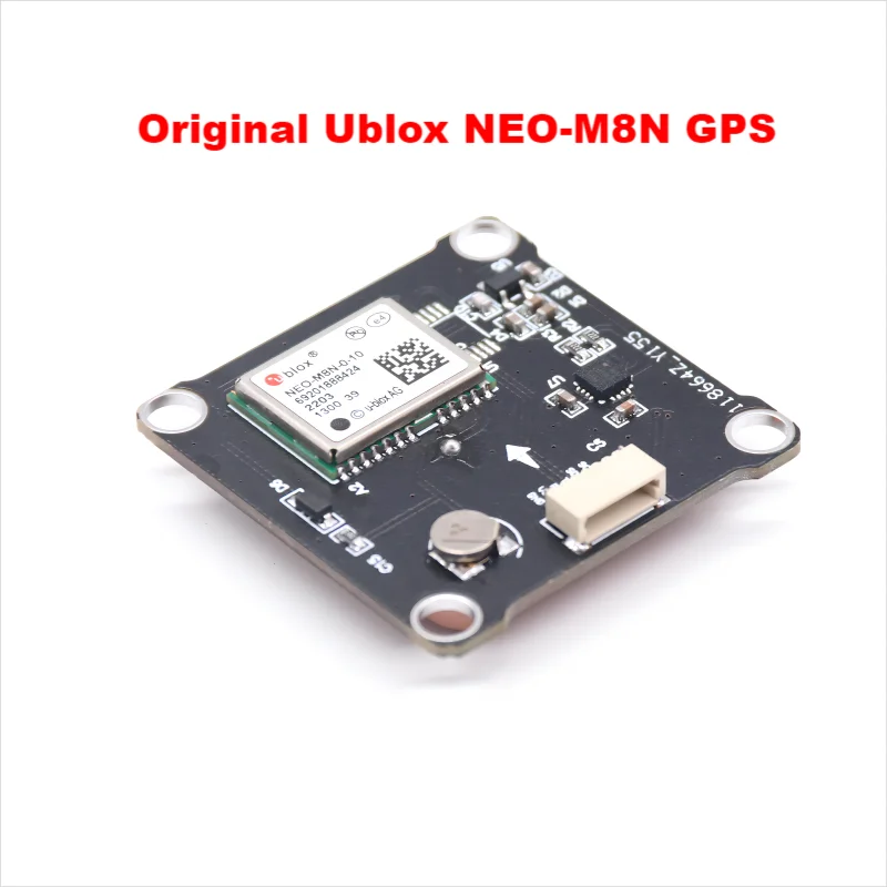 Module GPS NEO-M8N avec boussole QMC5883 posé sur une surface blanche, connecteur JST et câbles