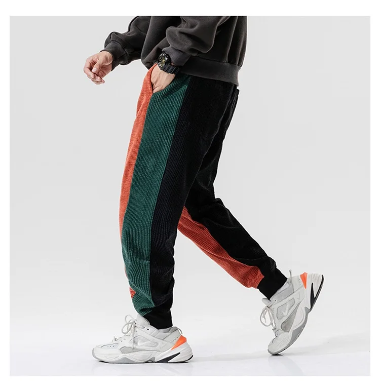 Men's track pants elastic waist back pants Street punk jogging pants Men's hip hop casual black pants Fashion streetwear jersey harem pants