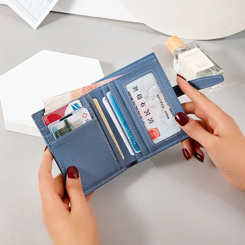 Women's short wallet 2021 new Korean version small fresh embroidery small wallet two fold draw belt multi card slot zero wallet