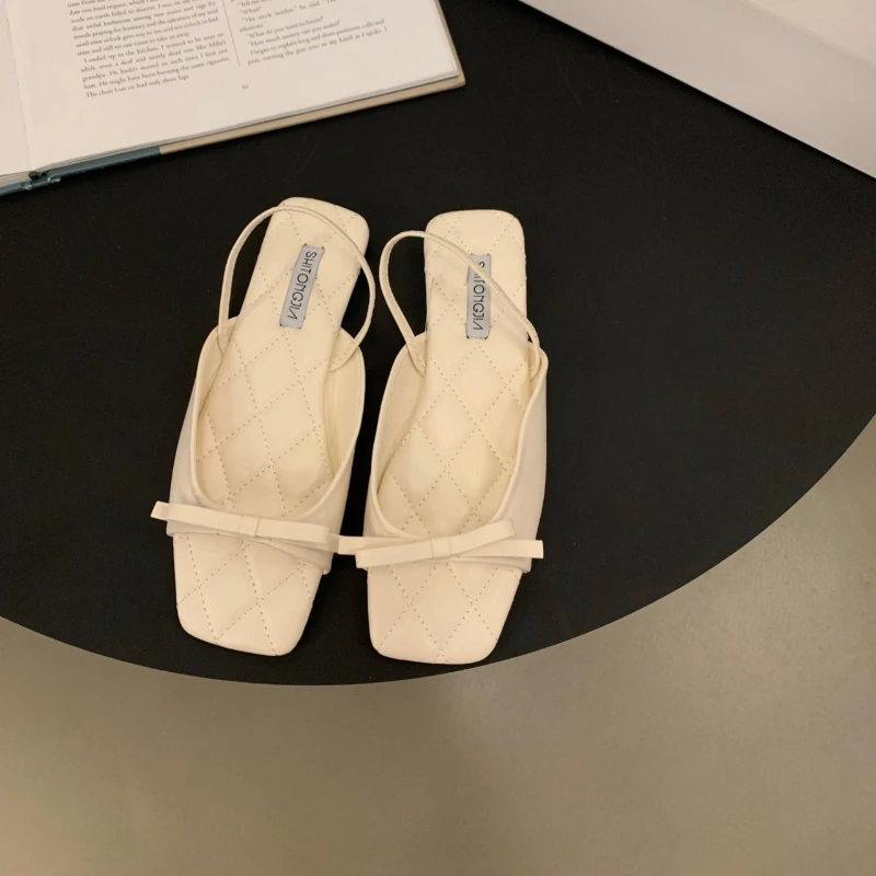 2024 new niche French black open-toed sandals for women summer bow soft soled beach Roman shoes