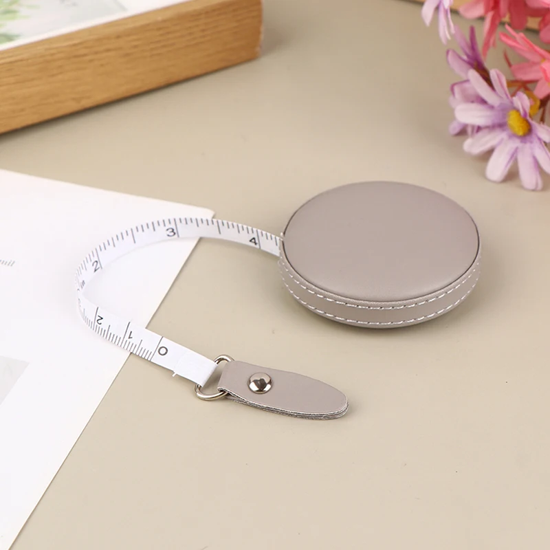 Description Picture 6 of item150cm 60" Portable Retractable Sewing Tailor Ruler Tape Measures Height Children Ruler Centimeter Inch Roll Tape Measuring Tool