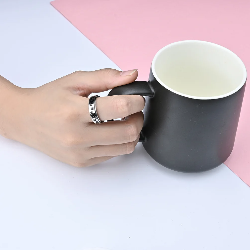6mm Stainless Steel Black Enamel Paw Print Spinner Ring for Women - PeticaDeals
