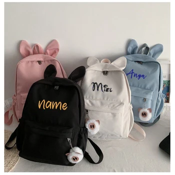 Orecchie di coniglio personalizzate e semplici Zaino in tessuto di nylon di nuova moda Nome ricamato personalizzato Borsa da studente per uomo e donna 1