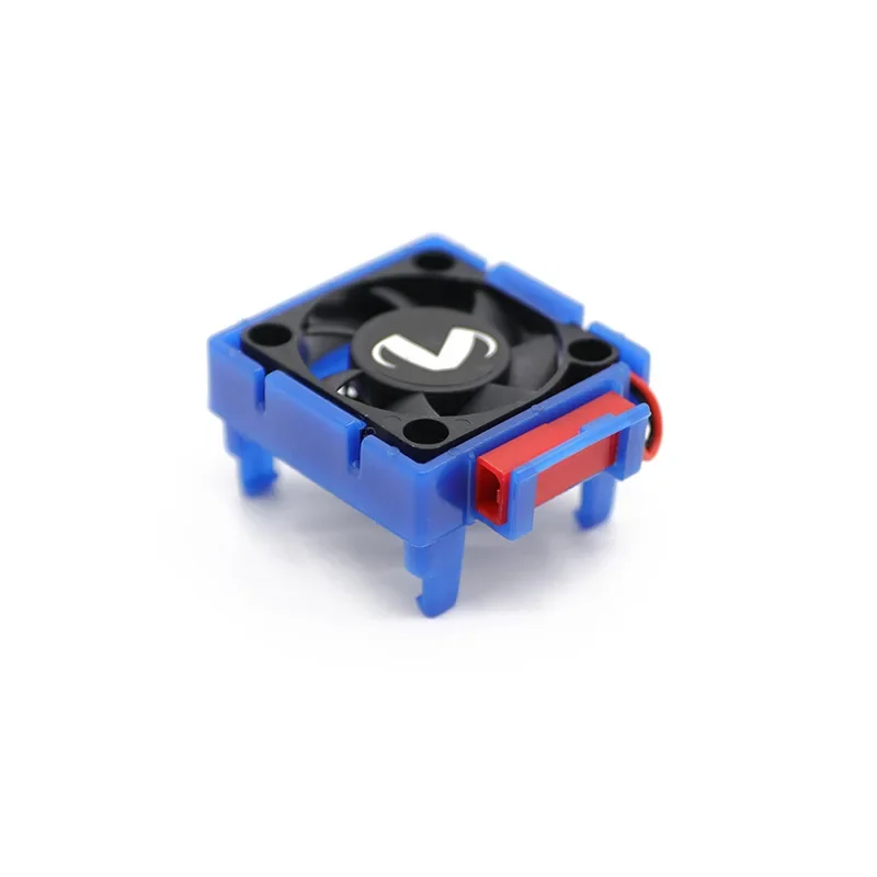 Gros plan sur le ventilateur de refroidissement VXL-3S pour voiture RC Traxxas montrant les pales et le logo Traxxas