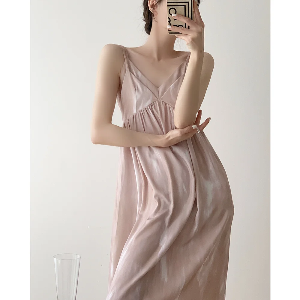 

Sanya seaside vacation dress for women with a high-end sense of summer new design sense, niche fairy style suspender beach skirt