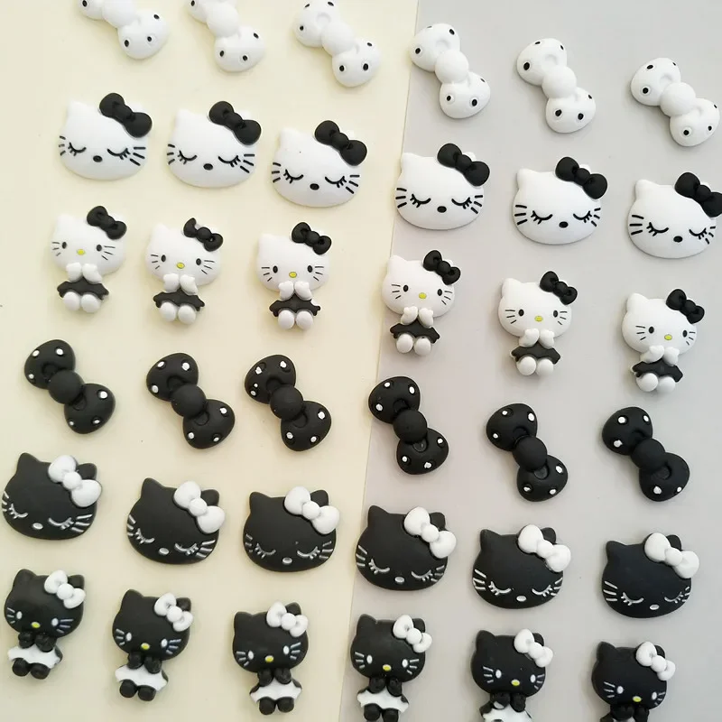 

10pcs/set Cartoon Sanrioed black and white Hello kitty Bow tie resin accessories diy cream gel mobile phone case material toys