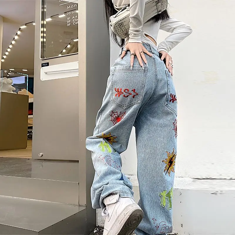 American Style Hippie Streetwear Oversize Straight Leg Jeans Woman Graffiti Drawing Feminine Denim Trousers Baggy Wide Leg Pants men s and women s jeans high street national tide hip hop music smiley hole hand painted graffiti print denim trousers