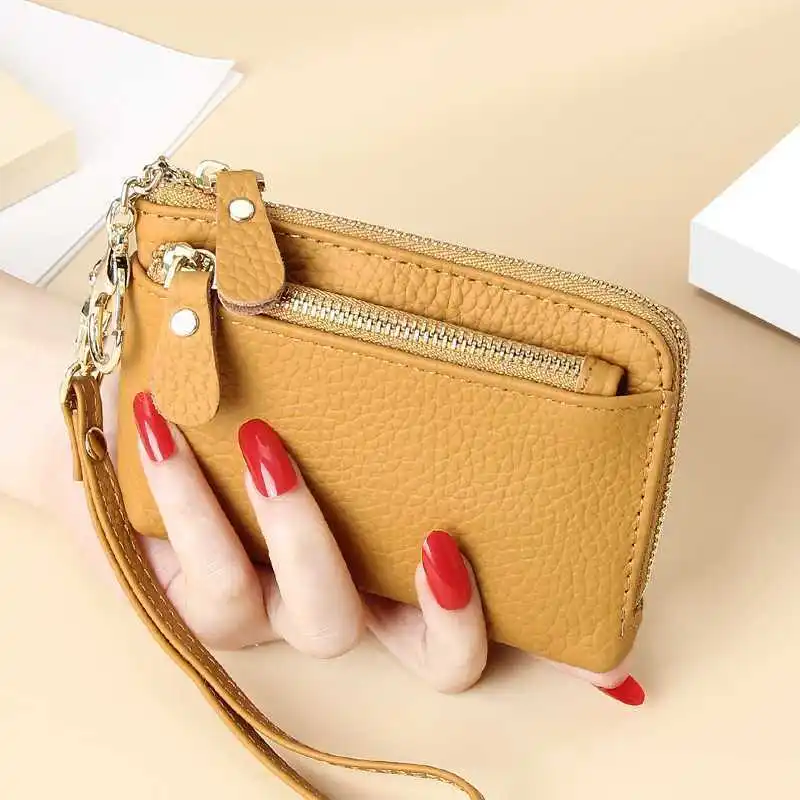 Multi functional zero wallet, high-end leather 2025 new model, women's simple hand-held strap, short wallet, card bag, coin bag