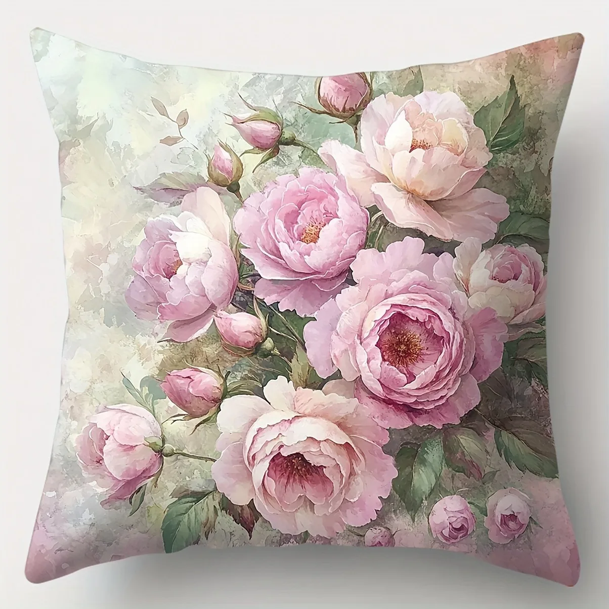 Pink floral pillow cover with leafy green background