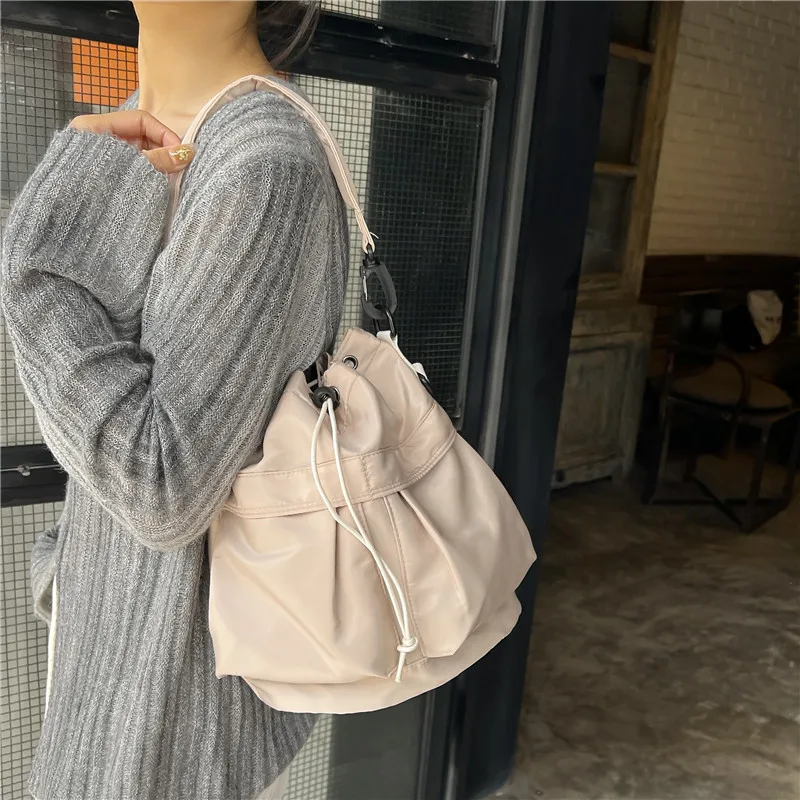 Korean Fashion Nylon Fabric Drawstring Bucket Bag Personalized Versatile Handheld One Shoulder Crossbody Bag for Daily Leisure