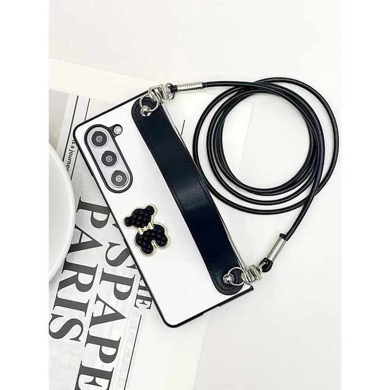 

Stylish Black Bear Wrist Bracelet Phone Case for Samsung Galaxy ZFold 5 ZFold 6 ZFold 4 3 2 Lanyard Necklace Chain Leather Cover