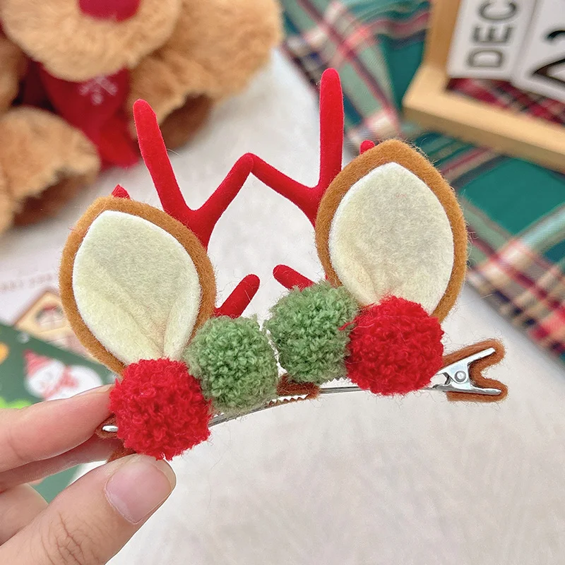 Red and green fur ball red antlers