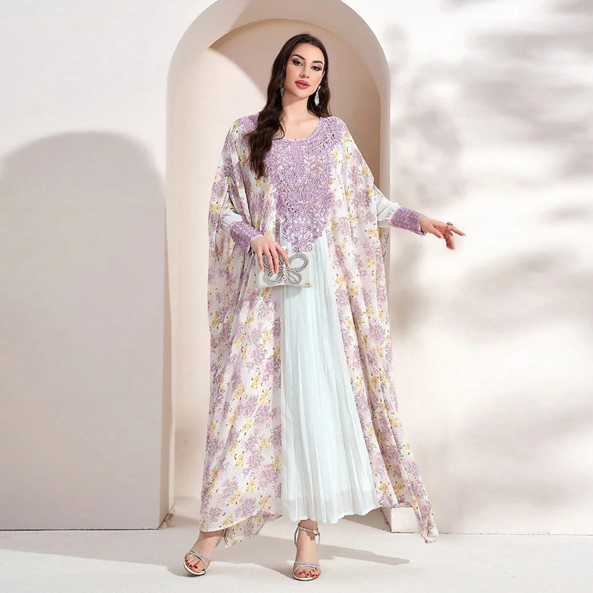 Uni Dubai فساتين أنيقة بأكمام تشبه جناح الخفّاش وم...