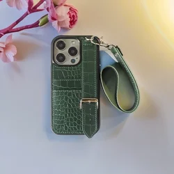 TPU Shiny Leather Texture Phone Case with Wrist Strap and Card Slot - iPhone 14 (Green)