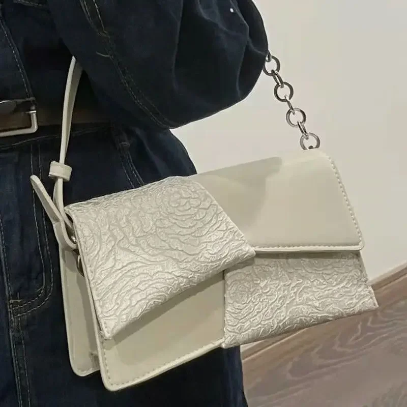 

Fashion Design Women's Underarm Bag Niche Chain Relief Handbag 2024 New Spliced Commuter One Shoulder Crossbody Bag for Women