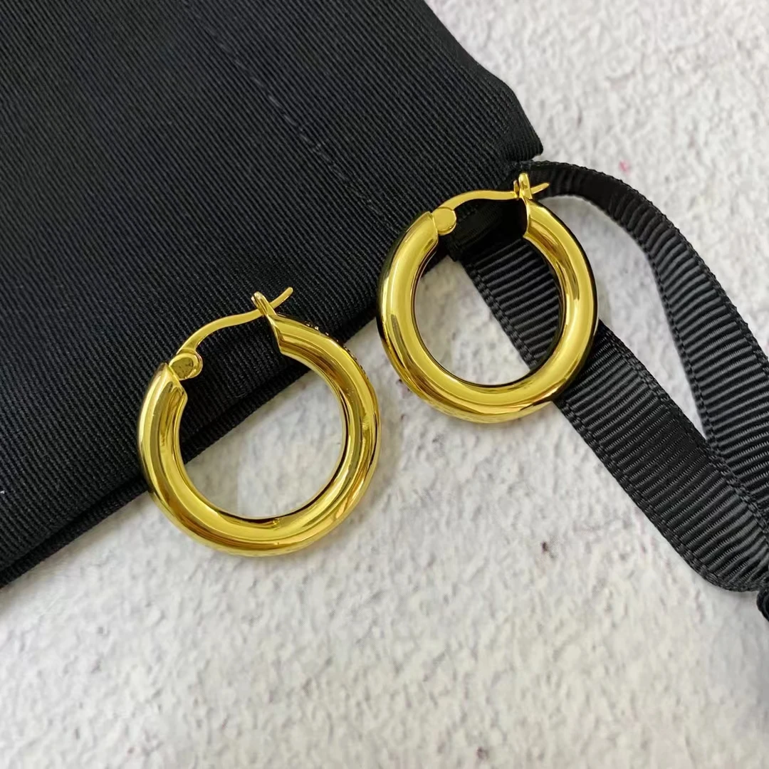 

High end, fashionable, minimalist, golden circular light luxury, niche design, personalized earrings