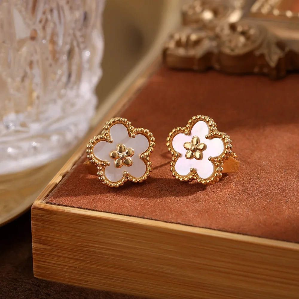 

Light luxury fashion flower five leaf clover earrings for women