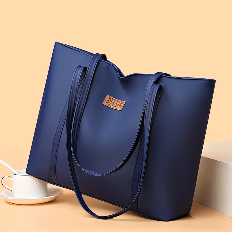 Women's tote bag, large capacity, handbag, multi pocket design, zipper closure, perfect for shopping, work, and daily travel