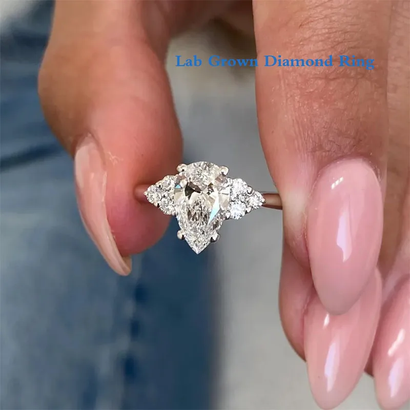 1 ct EF VS-VVS Birnenschliff CVD HPHT Lab Grown Diamant-Verlobungsring IGI-zertifizierter Birnen- und Rundcluster-Set Platin 950-Ring