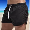 New Summer Men's Beach Pants Swimming Quick Dry Solid Color Tube Loose Drawstring Sports Shorts 5